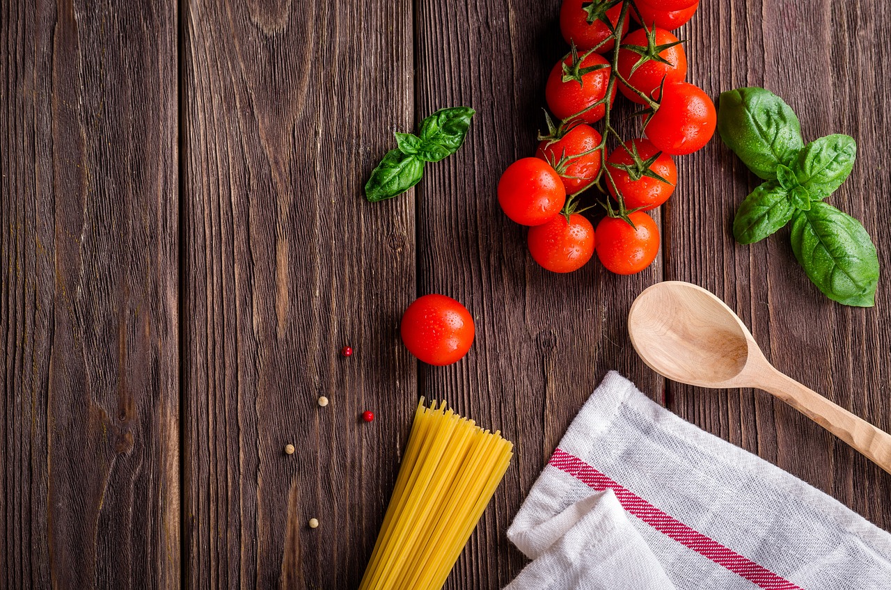 Qual a função de um auxiliar de cozinha?